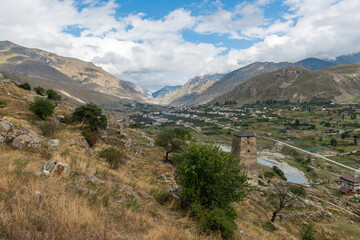 Naklejka premium Stunning view of caucasus mountains. The village Upper Balkaria in Kabardino-Balkaria, Cherek District, Russia.