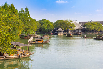 Naklejka premium Traditional wooden boats on the lake in west village Wuzhen, China