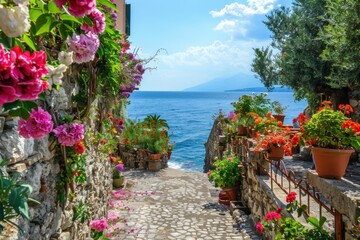 Fototapeta premium Beautiful Italian seaside town with vibrant flowers and stunning sea view on a sunny day - Generative ai