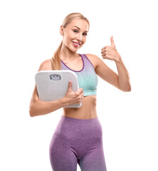 Fototapeta premium Happy woman with floor scale showing thumb up on white background