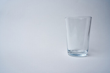 Small water glass on a white background.