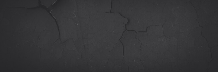 Dark wide panoramic background. Peeling paint on a concrete wall. Faded dark texture of old cracked...