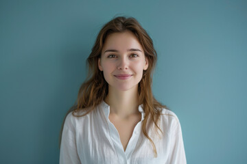Fototapeta premium A close up portrait of a young woman with a subtle smile