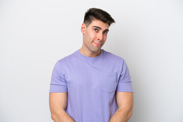 Young caucasian man isolated on white background having doubts while looking up