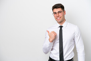 Business caucasian man isolated on white background pointing to the side to present a product