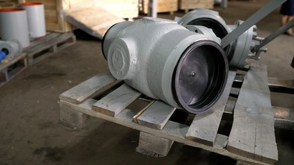 Valve close-up. Close-up of industrial pipes and valves in a factory. Concept of industrial pipes, valves. Production of industrial fittings.