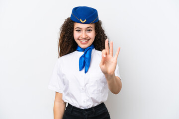 Airplane stewardess Arab woman isolated on white background happy and counting three with fingers