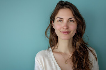 Obraz premium A close up portrait of a young woman with a subtle smile