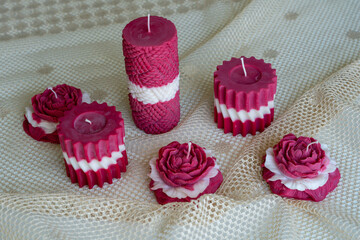 Mixed shaped red and white soy wax candles. Latvian flag colors