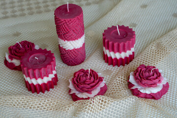Mixed shaped red and white soy wax candles. Latvian flag colors