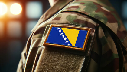 A soldier's uniform with the Bosnia and Herzegovina flag patch, symbolizing patriotism and service to the nation