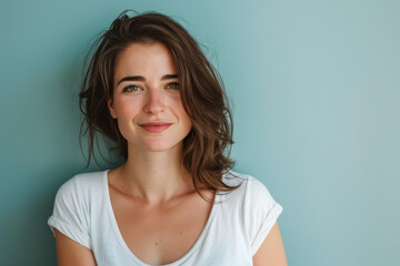 Fototapeta premium A close up portrait of a young woman with a subtle smile