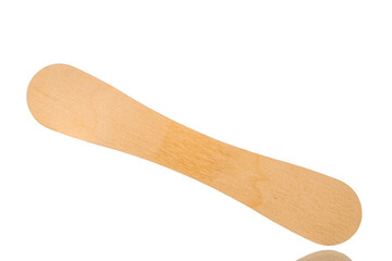 One wooden ice cream stick, macro, isolated on white background.