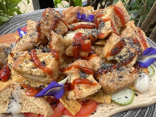 Fried tofu mixed sesame with tomato sauce