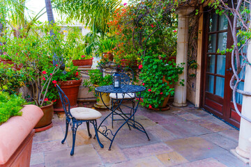 Cozy Patio Corner with Wrought Iron Furniture