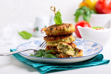 Zucchini fritters or zucchini pancakes.