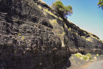 Deposits of pyroclasts distributed in layers. Each layer may correspond to different phases of the...