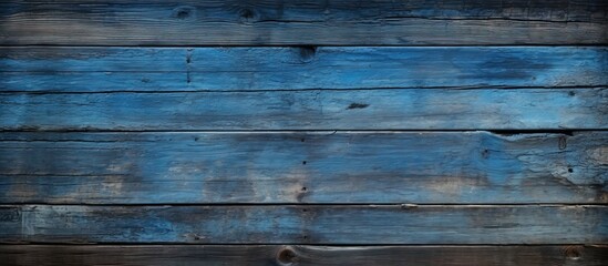 Obraz premium A seamless blue background with an old wooden floor perfect for incorporating copy space image