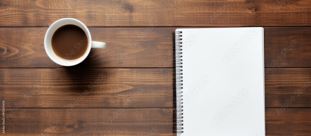 Aufkleber Notebook with notepad and coffee. copy space available