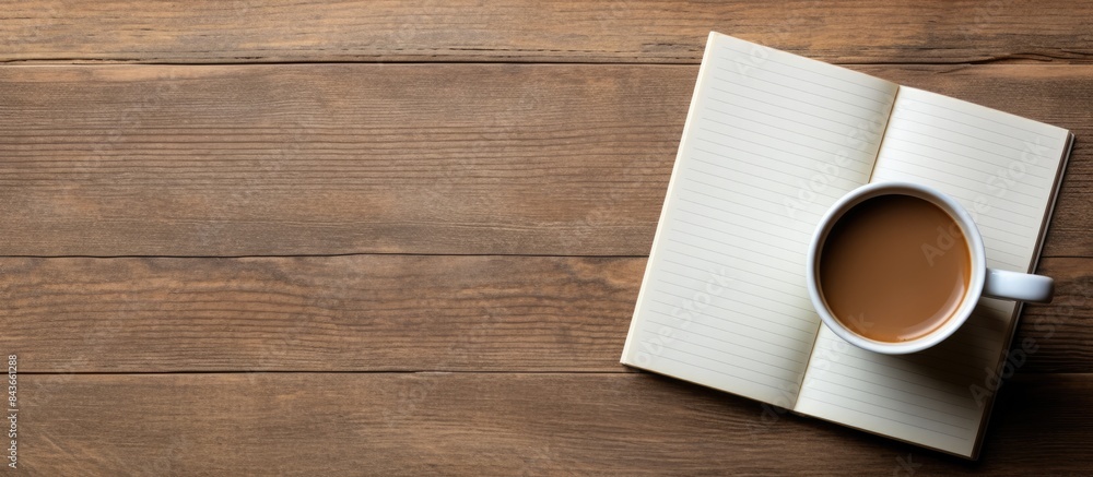 Aufkleber Notebook with notepad and coffee. copy space available