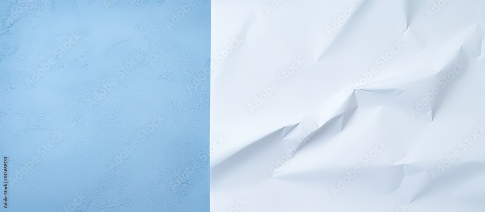 Aufkleber A white sheet of paper with copy space image on a blue textured background