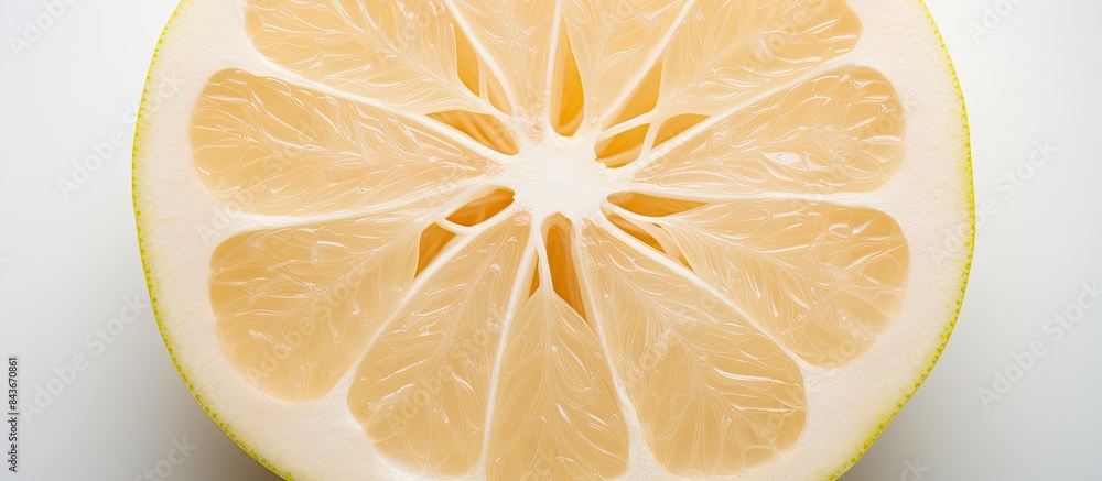 Aufkleber ripe cut pomelo and peel on light background with space for text top view. copy space available