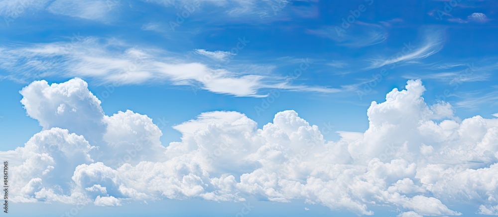 Poster The alternating blue sky and white clouds can serve as the background image. copy space available