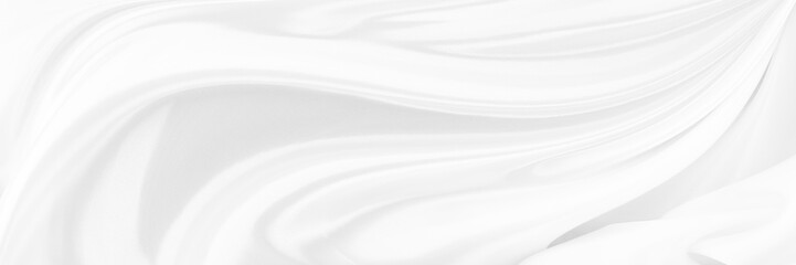 White gray satin texture that is white silver fabric silk panorama background with beautiful soft blur pattern natural.