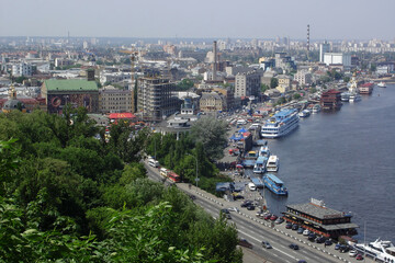 Fototapeta premium Kyiv, Ukraine - May 25, 2007 Panoramic View of Kyiv Podil District and Dnipro River from slopes