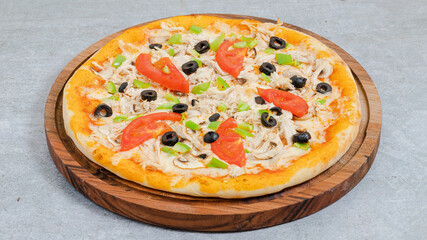 Delicious pizza isolated on wooden board