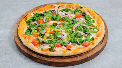 Delicious pizza isolated on wooden board
