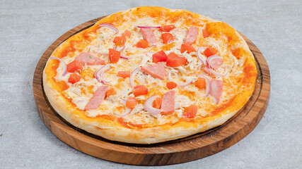 Delicious pizza isolated on wooden board