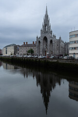 Fototapeta premium Urban cityscape of Cork city holy trinity church river Lee. Ireland Europe.