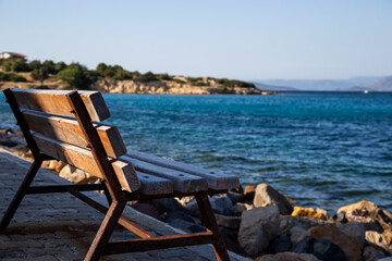 bench on the seashore with copy space