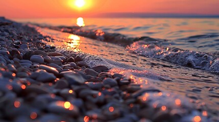 A beautiful sunset over the ocean with a rocky shoreline - Powered by Adobe