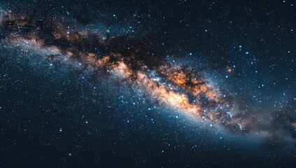 Obraz premium The Milky Way stretches across the sky, a ribbon of light weaving through the darkness of the cosmos.