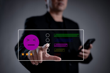 A businessman interacts with a virtual customer satisfaction interface on Mobile , evaluating...