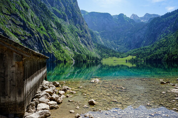 old wooden house at lake "obersee" in the alps