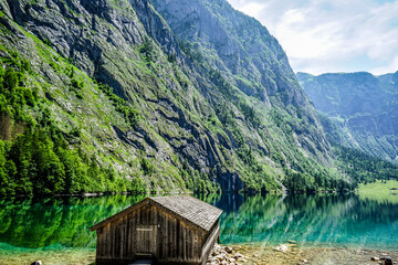 old wooden house at lake "obersee" in the alps