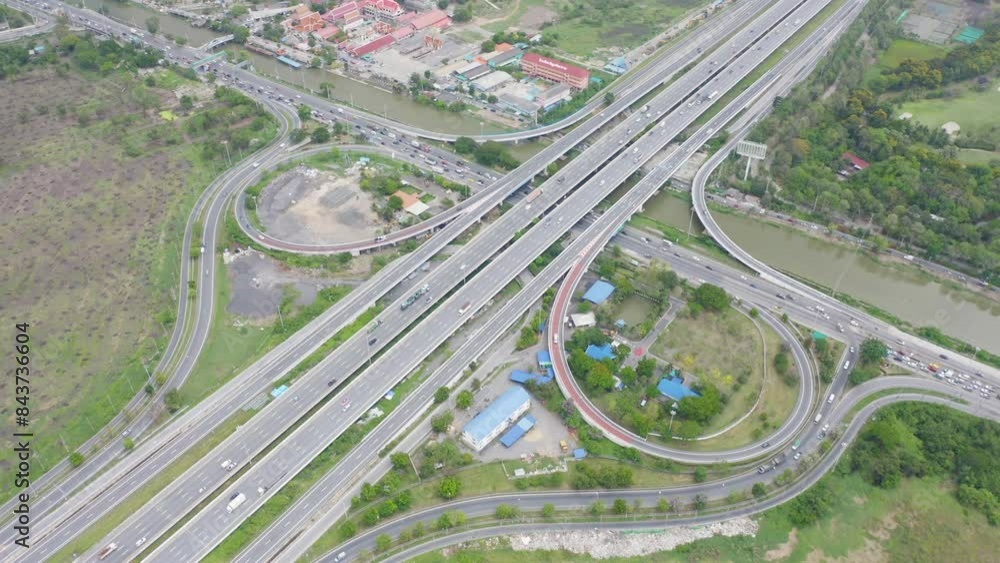 Poster aerial view of cars driving on highway or moterway. overpass bridge street roads in connection netwo