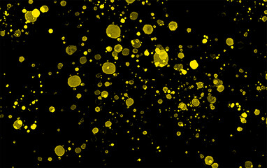 Bokeh of yellow color on black background