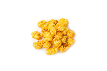 Delicious caramel popcorn isolated on white background. Cinema and entertainment concept. Movie night with popcorn. Cheese and caramel popcorn. Delicious appetizer, snack. Banner