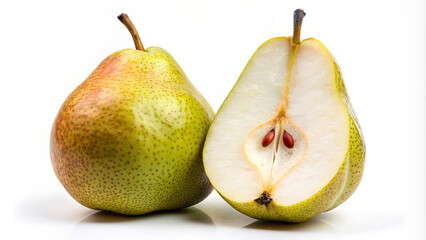 A whole green pear lies next to a cut pear revealing its white flesh and red seeds