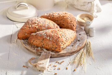 Healthy and fresh triangular rolls made of sourdough and flour.