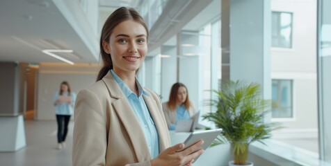 Fototapeta premium The businesswoman with tablet