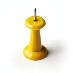 Isolated yellow pushpin on white background