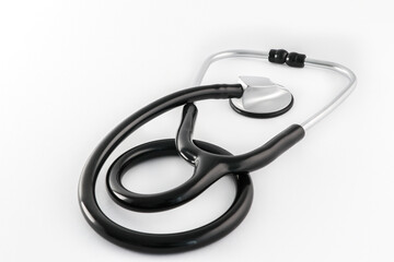 Black stethoscope on white background