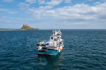 Lindisfarne Castle and boats