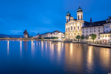 Night view of chapel bridge ,jesuitenkirche in old town are very famous and beautiful  landscape in Luzern Switzerland  