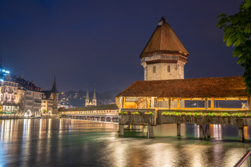 Night view of chapel bridge ,jesuitenkirche in old town are very famous and beautiful  landscape in Luzern Switzerland  